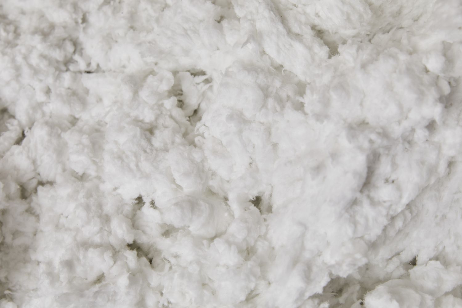 Traditional Blown-In Cellulose Attic Insulation Installation Process Professional insulation contractor using specialized equipment to blow dense-pack cellulose insulation into residential attic space, achieving high R-value thermal resistance for traditional home energy efficiency upgrade comparing costs versus smart glass technology - InfoProds 2026