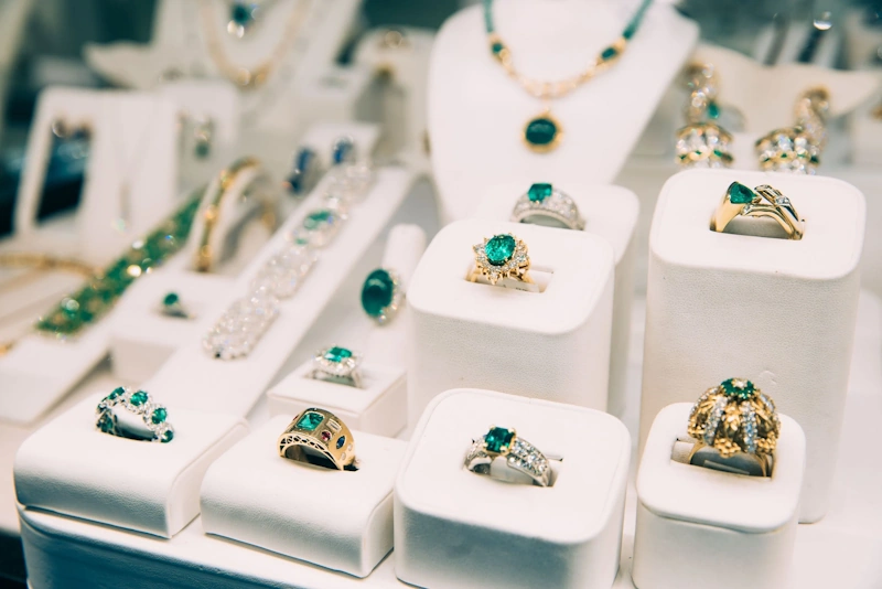 Christie's Sotheby's auction house jewelry exhibition showing investment grade pieces available at wholesale-adjacent pricing avoiding retail markup trap destroying consumer jewelry investment returns - InfoProds 2026