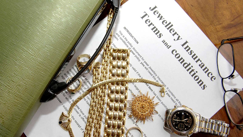 Jewelry Insurance and Appraisal - Protecting Your Precious Investment with Proper Documentation Diamond engagement ring with appraisal certificate and insurance documents showing importance of jewelry documentation