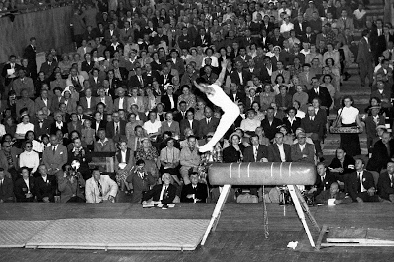 Gymnastics Scoring Scandal Historical Corruption Evidence Gymnastics judging scandal history from Soviet-era blatant corruption to modern subtle bias showing evolution of scoring manipulation affecting Olympic competitions - InfoProds 2026