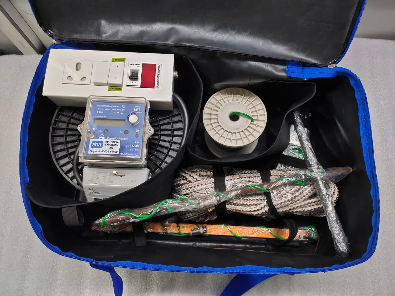 Complete electric vehicle charging accessory toolkit Comprehensive electric vehicle charging accessories collection including portable chargers, cable organizers, smart schedulers, adapters, emergency backup power station, and diagnostic tools for optimal EV ownership experience -