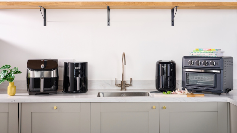 Electricity usage meter showing energy consumption comparison between cooking appliances