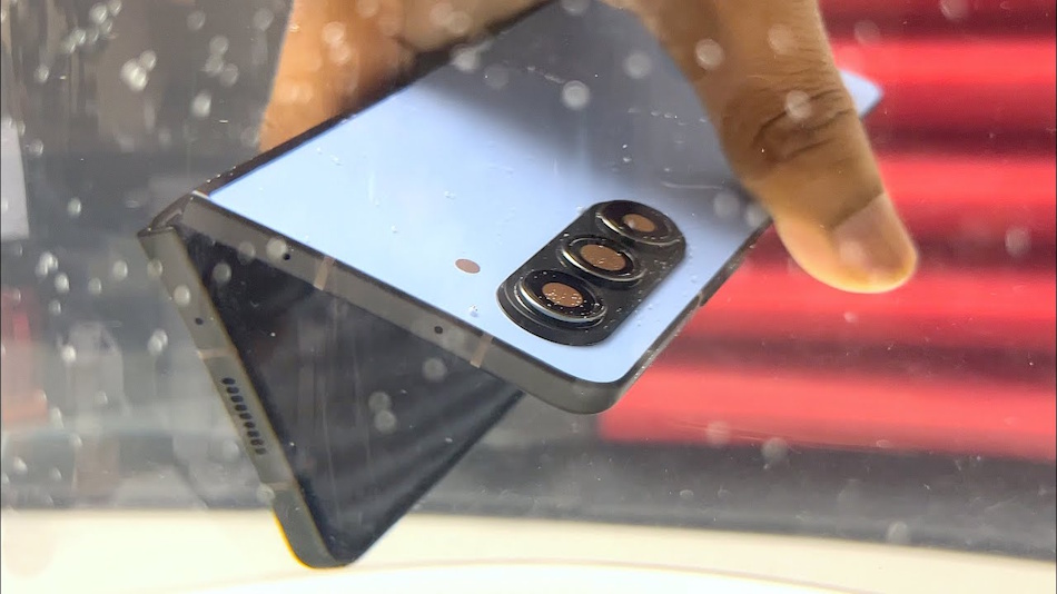 Smartphone Durability Testing and Water Resistance Evaluation Professional smartphone durability testing environment showing water resistance evaluation, drop testing equipment, and quality control processes for foldable and rollable phone reliability assessment demonstrating engineering standards in mobile device manufacturing - InfoProds