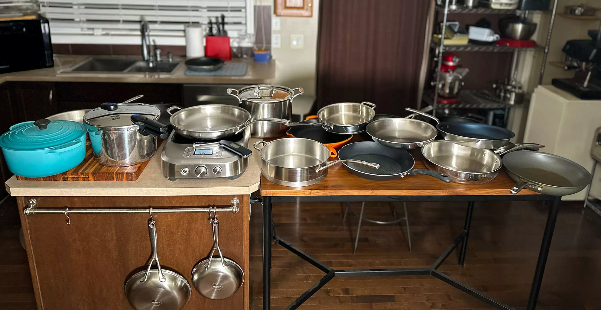 Professional testing of budget nonstick cookware and luxury stainless steel pans on commercial stovetop using infrared thermometer to measure heat distribution and temperature consistency for blind cooking comparison evaluation - InfoProds Cookware Testing 2026