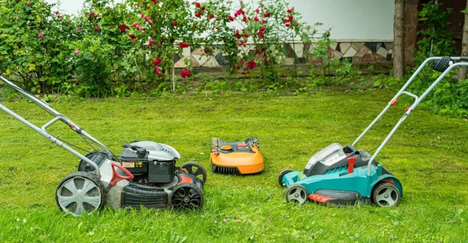 Environmental Comparison Electric Robotic Mower vs Gas-Powered Traditional Mower Side-by-side comparison of quiet electric robotic lawn mower operation versus loud gas-powered traditional mower, emissions visualization, environmental impact difference, EPA air quality standards compliance demonstration - InfoProds Green Technology 2026
