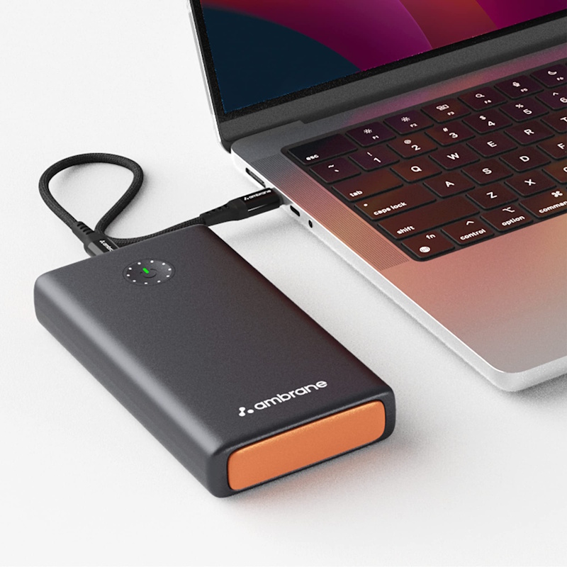 High-capacity power bank charging laptop via USB-C demonstrating mobile workstation power capability