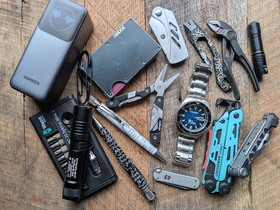 Professional Everyday Carry EDC Gear Layout Office Car Hiking Emergency Preparedness Organized everyday carry EDC essentials including multi-tool knife flashlight first aid kit paracord emergency supplies laid out on tactical background showing professional preparedness gear for office car hiking scenarios - InfoProds 2026