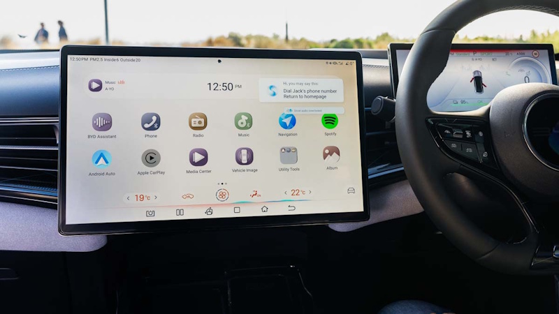 Wireless CarPlay and Android Auto Dashboard Display Comparison Modern car dashboard displaying wireless Apple CarPlay and Google Android Auto interface comparison showing connectivity features navigation controls and smartphone integration systems in 2026 vehicles - InfoProds 2026